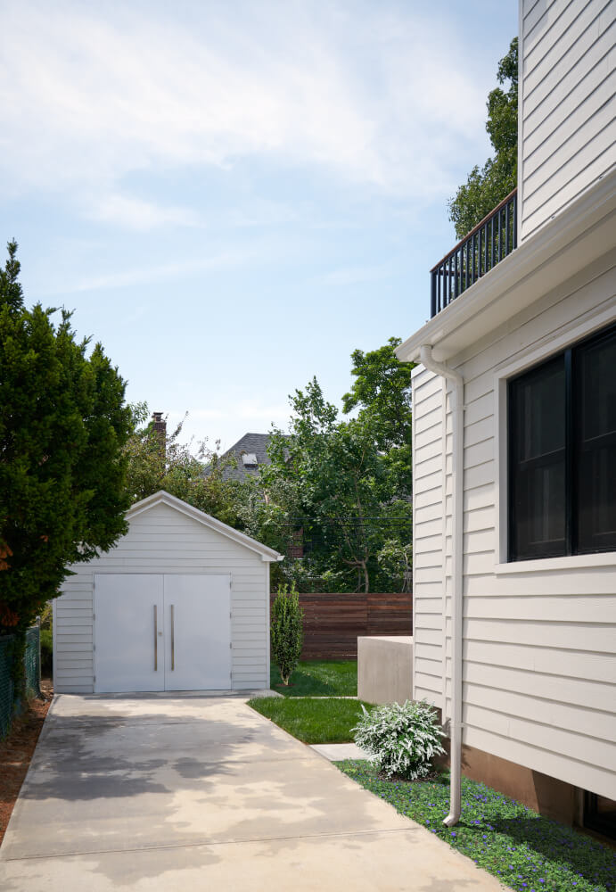 Flushing House, Garage by Sherman Architects