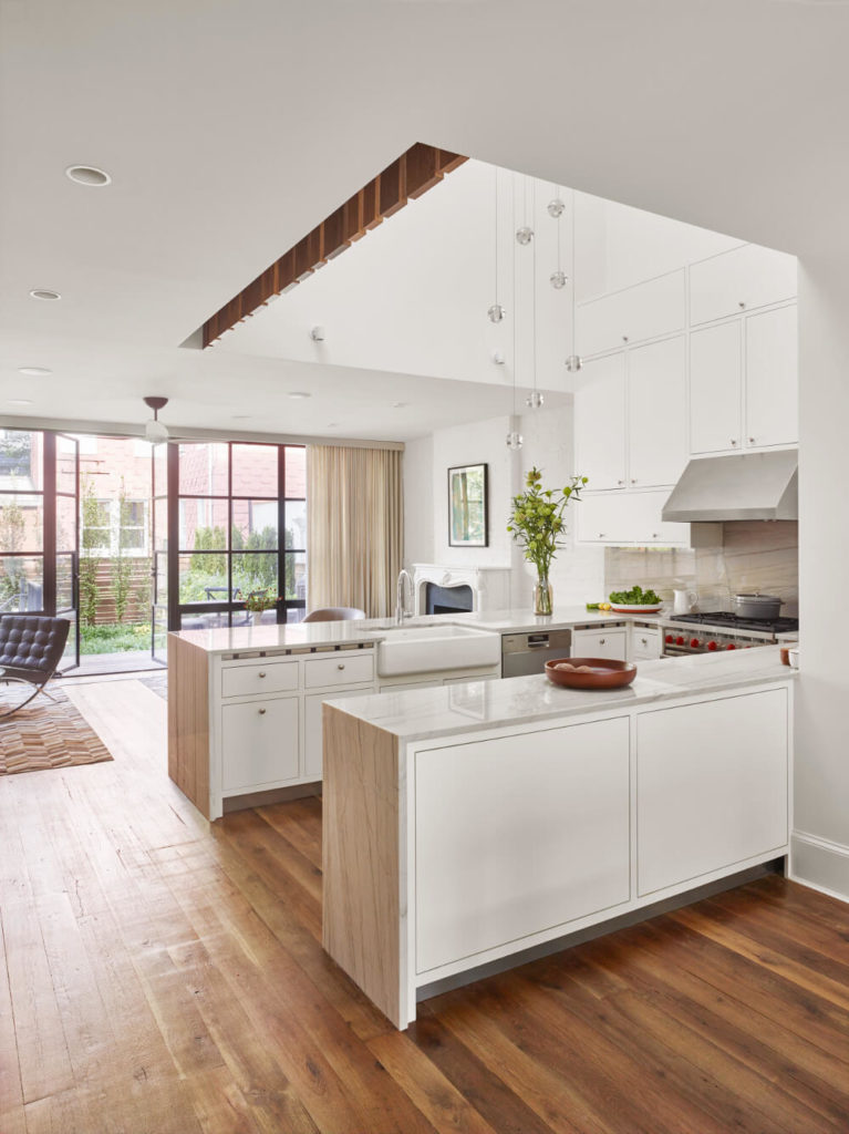 Greenpoint Row House: double-height space at kitchen by Sherman Architects