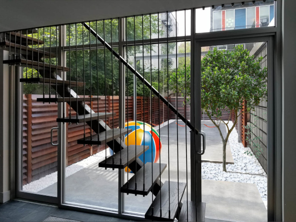 East Harlem row house stair & backyard